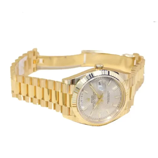 1 rolex daydate 40mm yellow gold silver diagonal motif index dial fluted bezel president bracelet 228238 1.webp