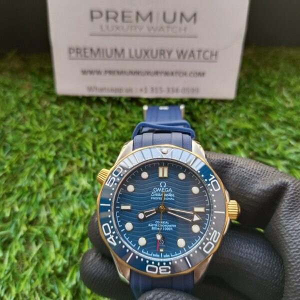 2 omega seamaster 300m coaxial master chronometer ceramic blue gold dial on rubber strap automatic mens watch 1.jpg