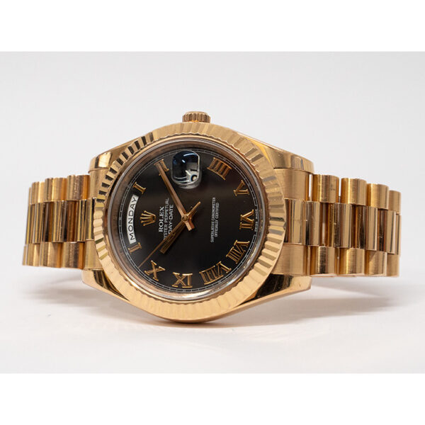 2 rolex daydate 41mm black roman dial fluted bezel president bracelet yellow gold watch 228238 1.jpg