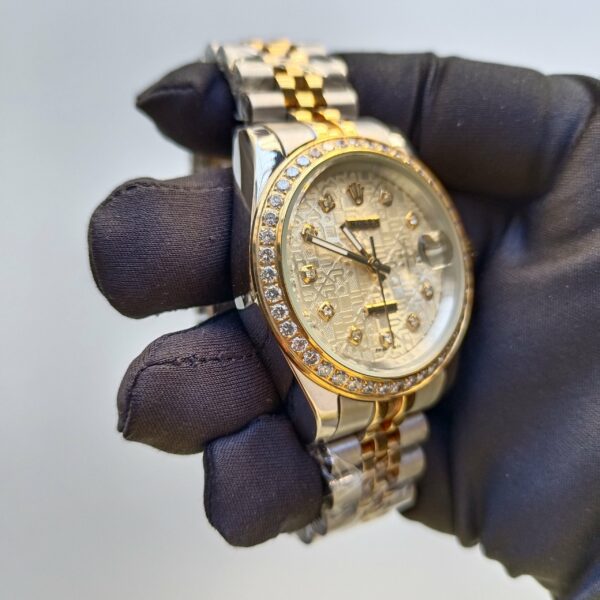 rolex datejust 41mm champagne diamond dial with two tone jubilee bracelet replica oqk27.jpg