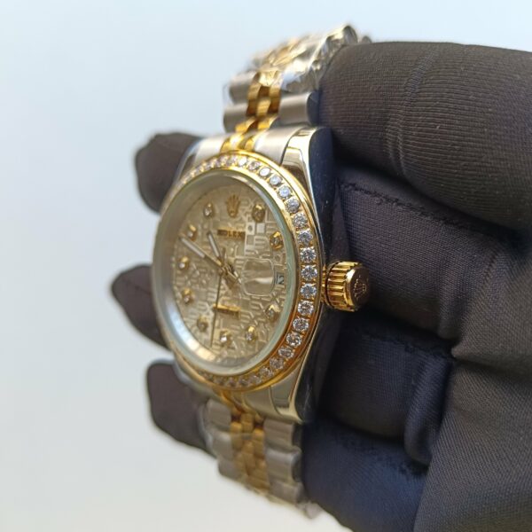 rolex datejust 41mm champagne diamond dial with two tone jubilee bracelet replica qvhti.jpg