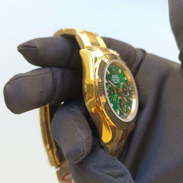 rolex daytona yellow gold 40mm green index dial yellow gold bezel oyster bracelet 116508 replica 9saik.jpg