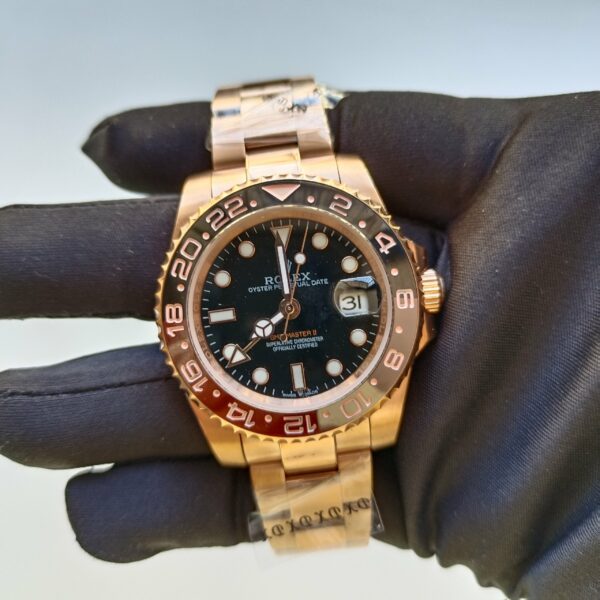 rolex gmt master ii rose gold 40mm black dial brownblack ceramic bezel oyster bracelet 126715chnr replica 1asq7.jpg