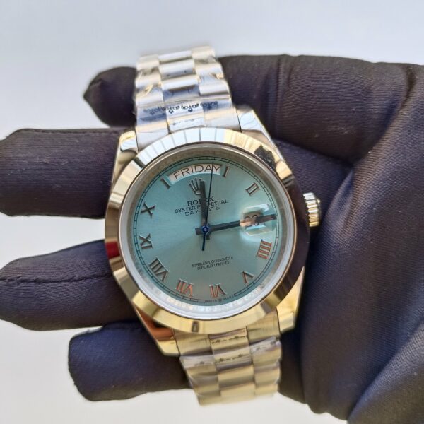 rolex platinum day date 40 watch smooth bezel ice blue roman dial president bracelet replica mdumt.jpg