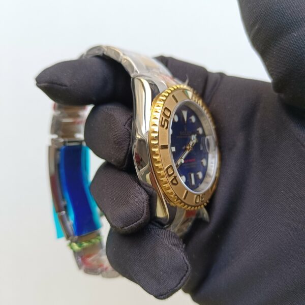 rolex yacht master 40 yellow goldstainless steel blue dial oyster bracelet watch replica 2cum9.jpg